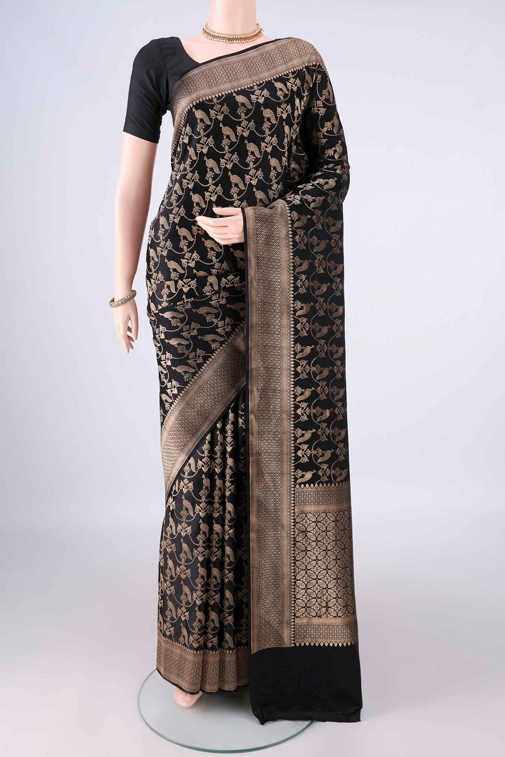 Pure Silk Black Banarasi Saree with Zari Brocade on the body and Zari Border.  displayed on a mannequin