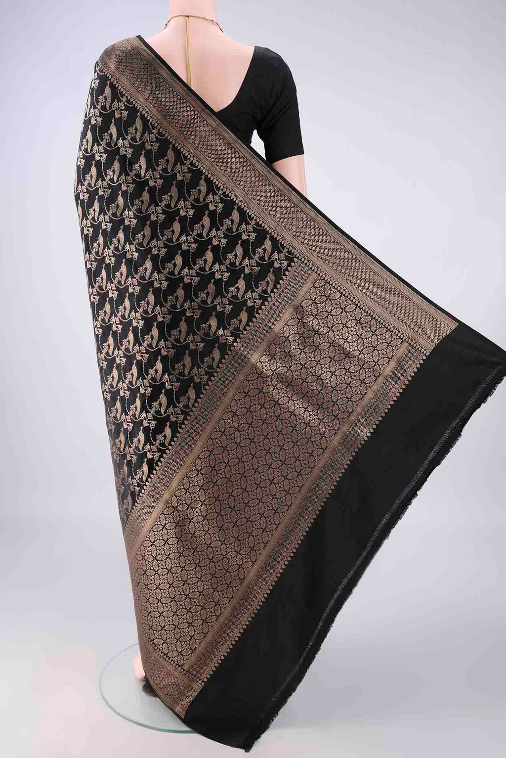 Flat view of Pure Silk Black Banarasi Saree with Zari Brocade on the body and Zari Border. 