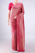 Pure Silk Rani Pink Banarasi Saree with Zari Brocade on the body and Zari Border.  displayed on a mannequin