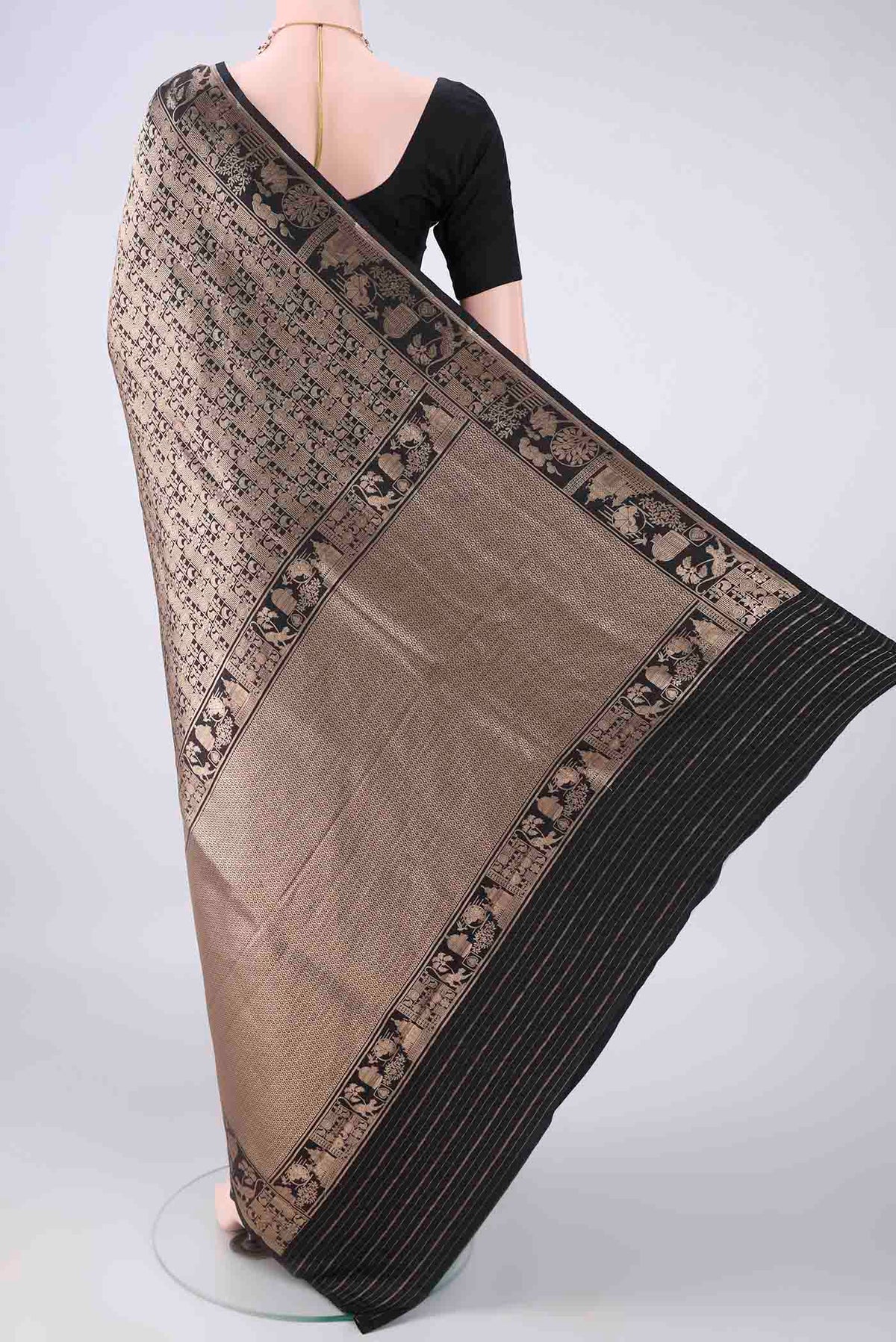 Flat view of Pure Silk Black Banarasi Saree with Zari Brocade on the body and Zari Border. 