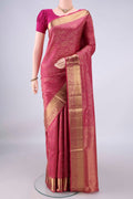 Pure Silk Pink Soft Saree with Zari Brocade on the body and Zari Border.  displayed on a mannequin