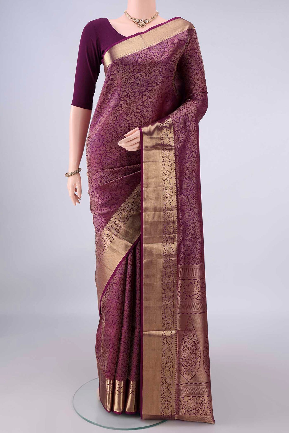 Pure Silk Purple Soft Saree with Zari Brocade on the body and Zari Border.  displayed on a mannequin