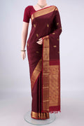 Pure Silk Coffee Brown Kanjivaram Saree with Zari Butta on the body and Zari Border.  displayed on a mannequin