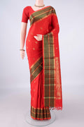 Pure Silk Red Kanjivaram Saree with Zari Butta on the body and Zari Border.  displayed on a mannequin