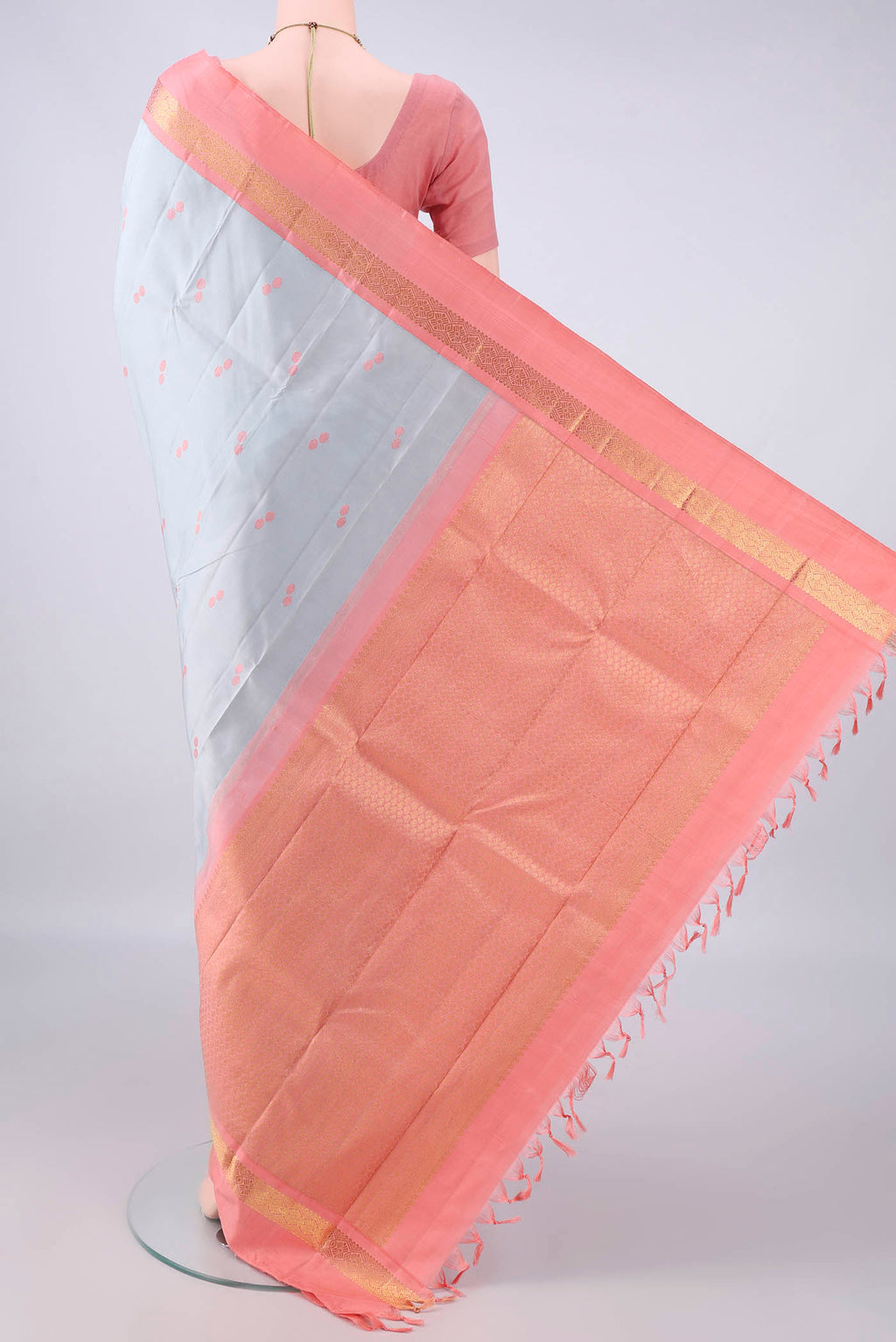 Flat view of Pure Silk Grey Dual Tone Kanjivaram Saree with Thread Butta on the body and Zari Border. 