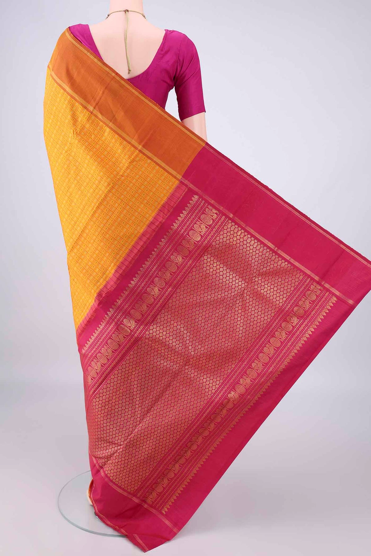Flat view of Pure Silk Yellow Kanchipuram Saree with Checked design on the body and Plain Border. 