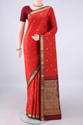 Pure Silk Orange Kanjivaram Saree with Zari Butta on the body and Zari Border.  displayed on a mannequin