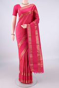 Pure Silk Rani Pink Kanjivaram Saree with Zari Butta on the body and Zari Border.  displayed on a mannequin