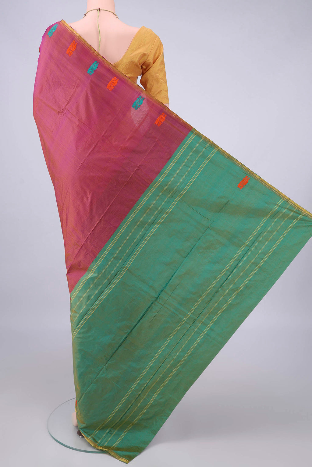 Flat view of Pure Silk Pink with Orange Color Kanchipuram Saree with Plain Body and Zari Border. 