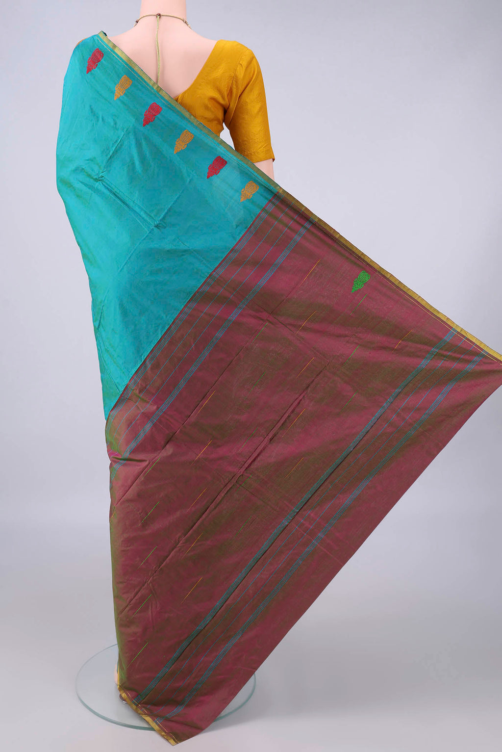 Flat view of Pure Silk Sea Green Kanchipuram Saree with Plain Body and Zari Border. 