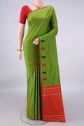 Pure Silk Green Kanchipuram Saree with Plain Body and Zari Border.  displayed on a mannequin