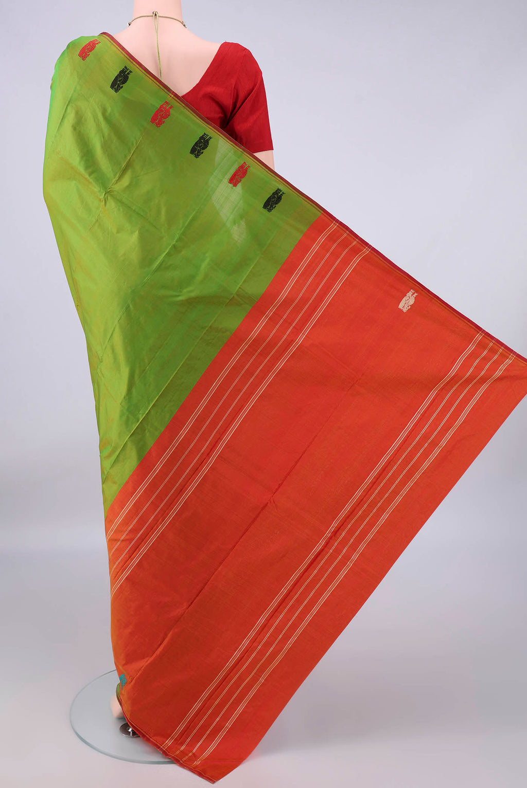 Flat view of Pure Silk Green Kanchipuram Saree with Plain Body and Zari Border. 