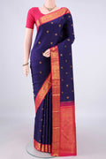 Pure Silk Navy Blue Kanjivaram Saree with Zari Butta on the body and Zari Border.  displayed on a mannequin