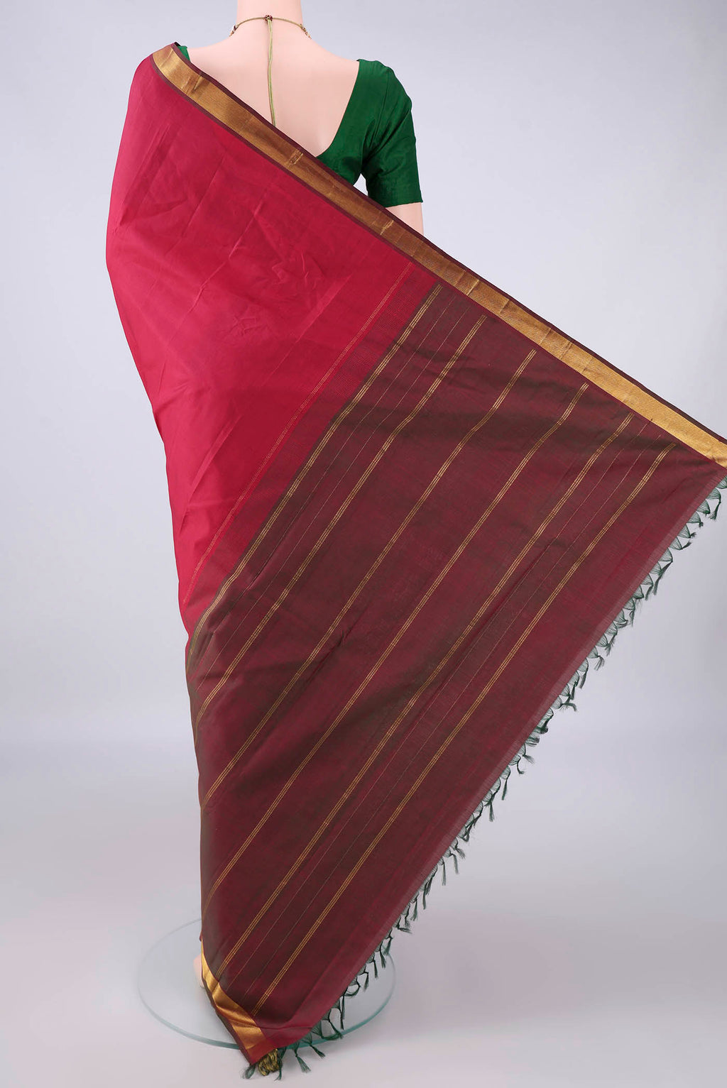 Flat view of Pure Silk Red Kanjivaram Saree with Plain Body and Zari Border. 