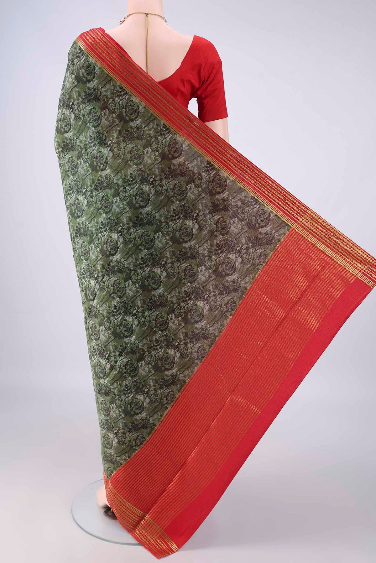Flat view of Green Mysore Crepe Saree with Printed design on the body and Zari Border. 