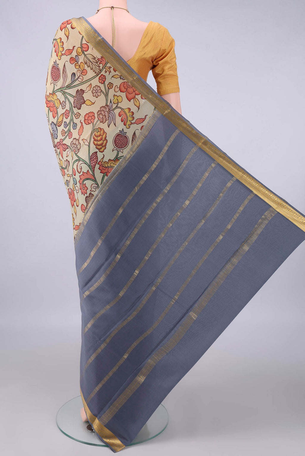 Flat view of Dark Beige Mysore Crepe Saree with Printed design on the body and Zari Border. 