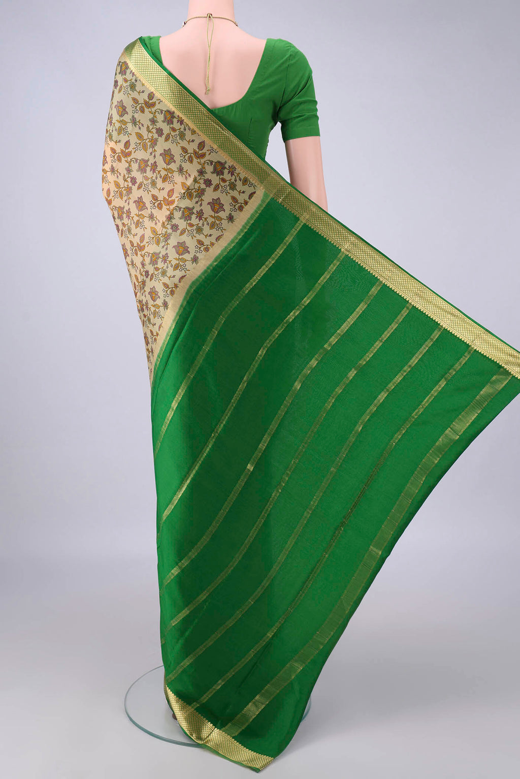 Flat view of Dark Beige Mysore Crepe Saree with Printed design on the body and Zari Border. 