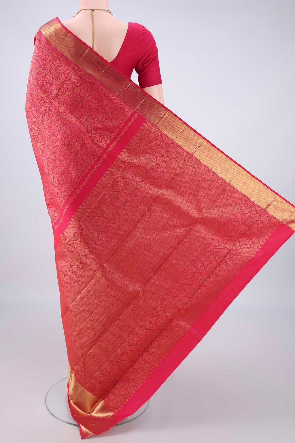 Flat view of Pure Silk Dark Pink Kanchipuram Saree with Zari Brocade on the body and Zari Border. 