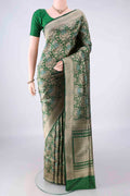 Pure Silk Green Banarasi Saree with Zari Brocade on the body and Zari Border.  displayed on a mannequin