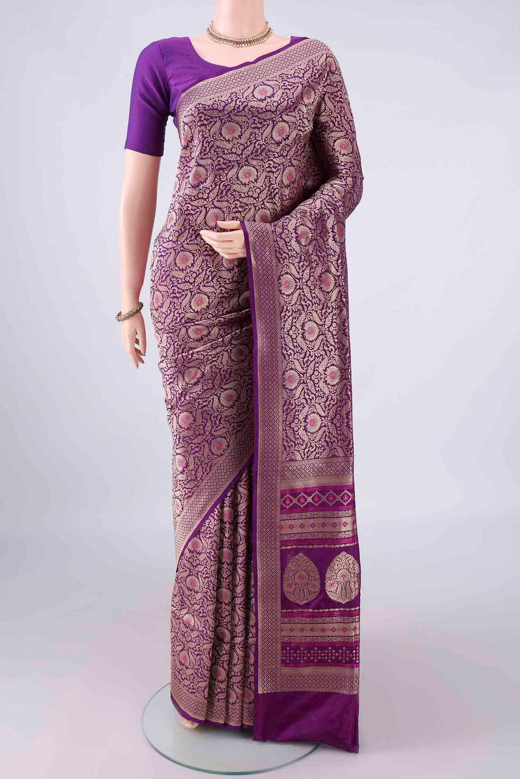 Pure Silk Purple Banarasi Saree with Zari Brocade on the body and Zari Border.  displayed on a mannequin