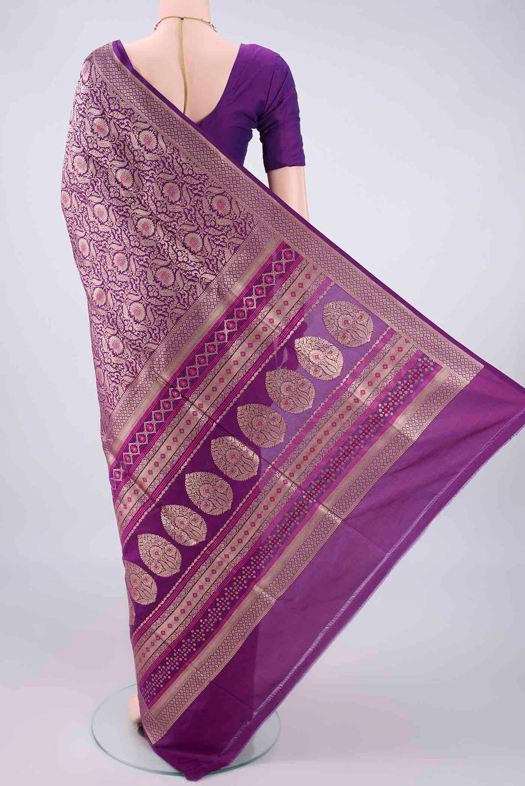 Flat view of Pure Silk Purple Banarasi Saree with Zari Brocade on the body and Zari Border. 