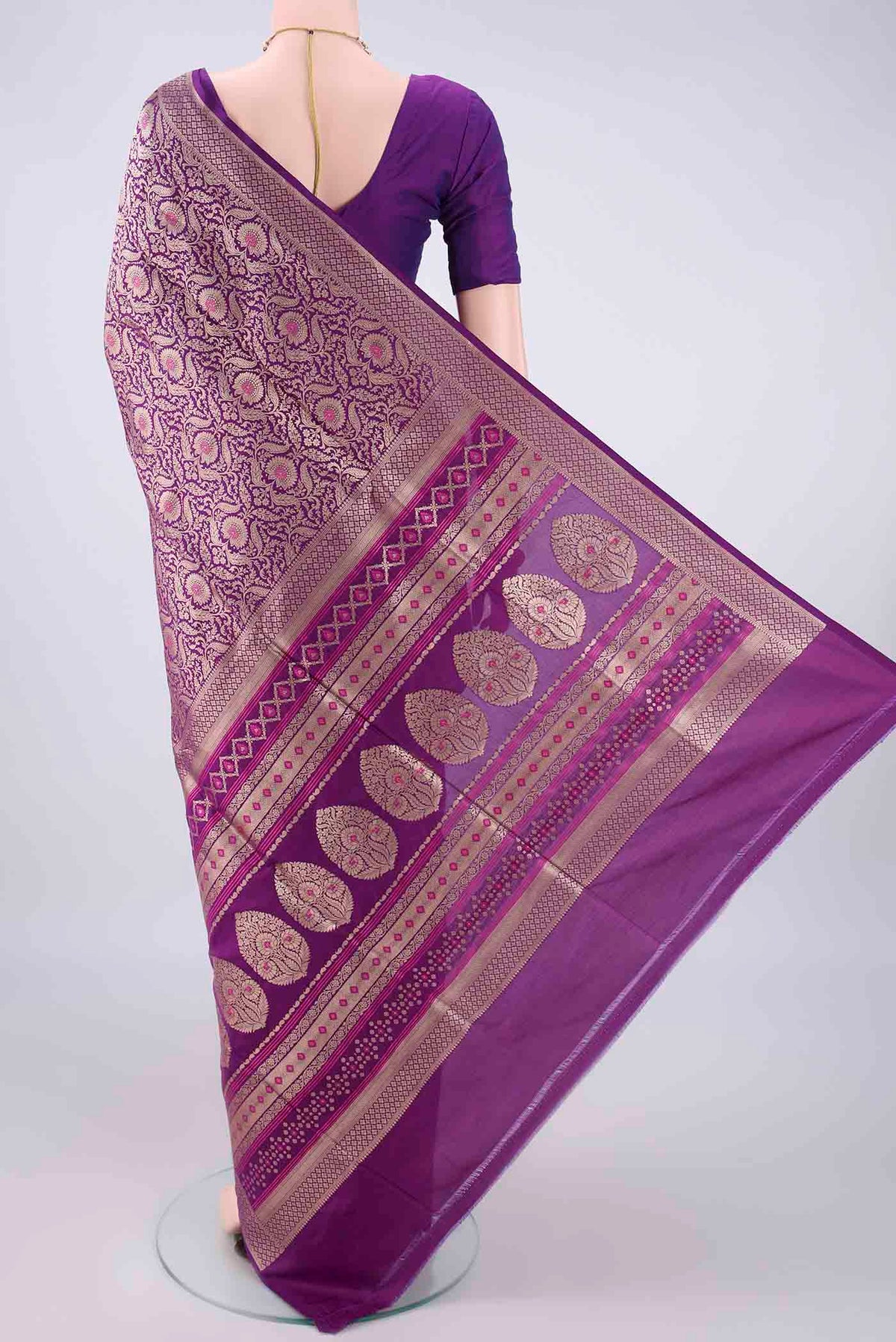 Flat view of Pure Silk Purple Banarasi Saree with Zari Brocade on the body and Zari Border. 