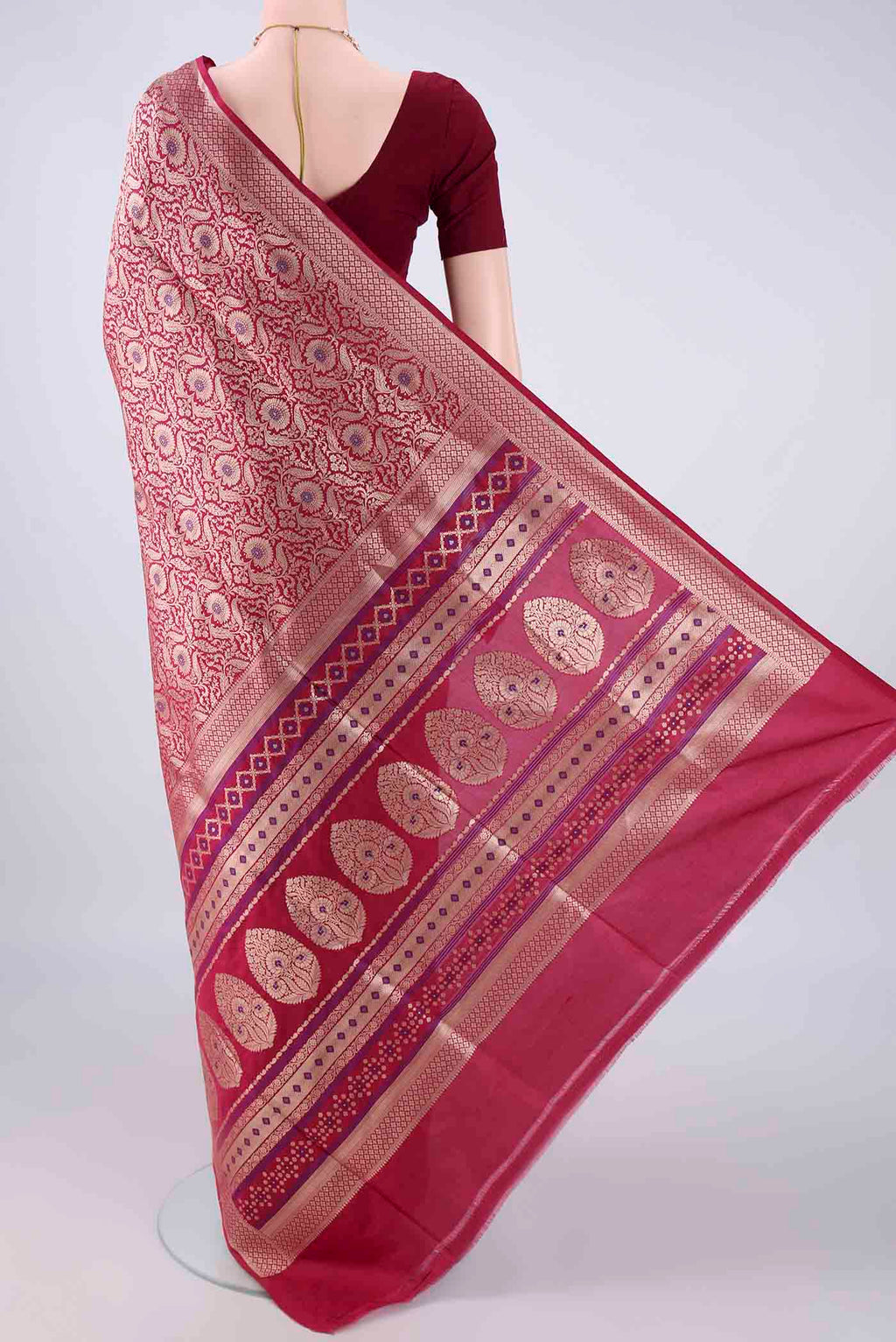 Flat view of Pure Silk Maroon Banarasi Saree with Zari Brocade on the body and Zari Border. 