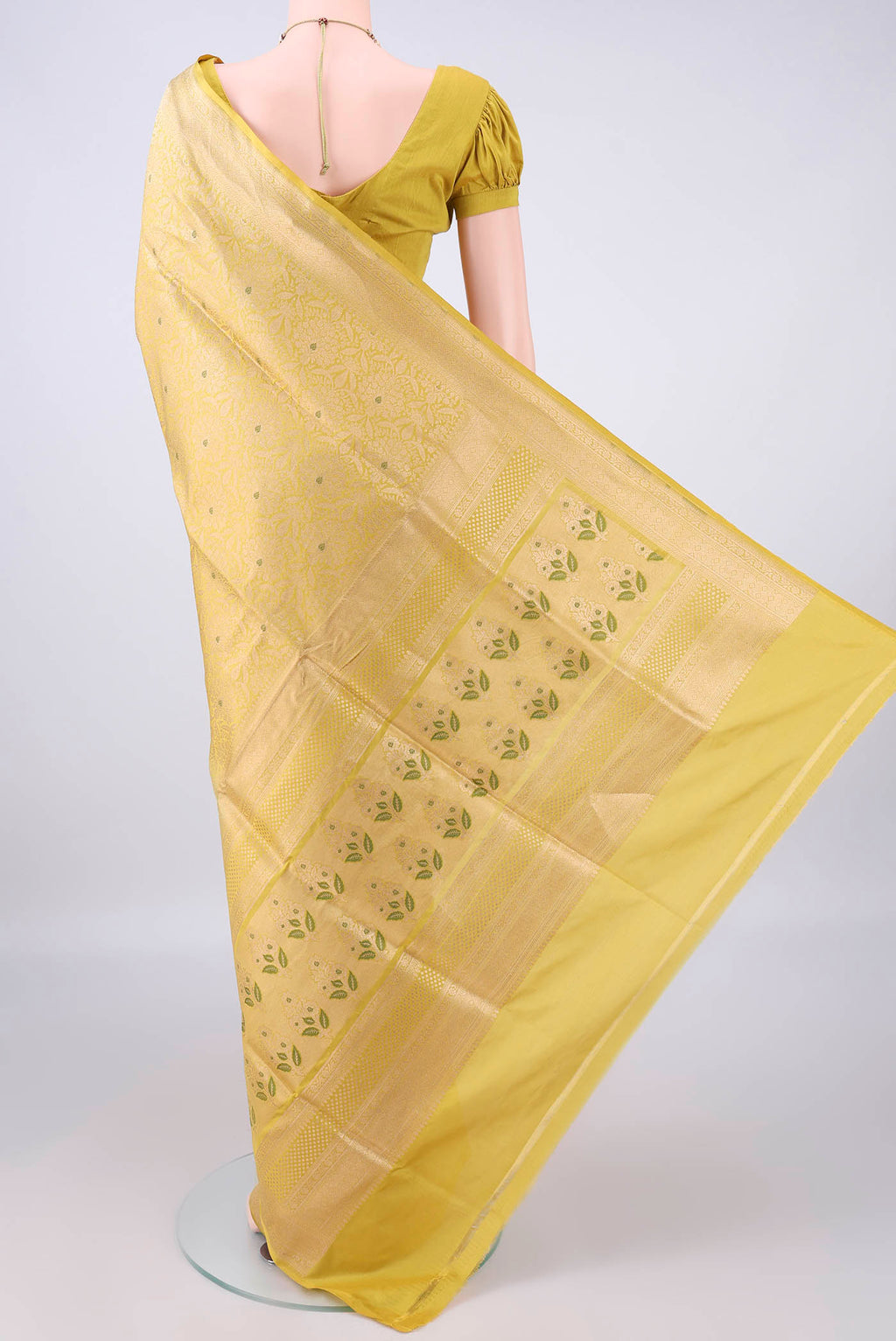 Flat view of Pure Silk Yellow Banarasi Saree with Zari Brocade on the body and Zari Border. 