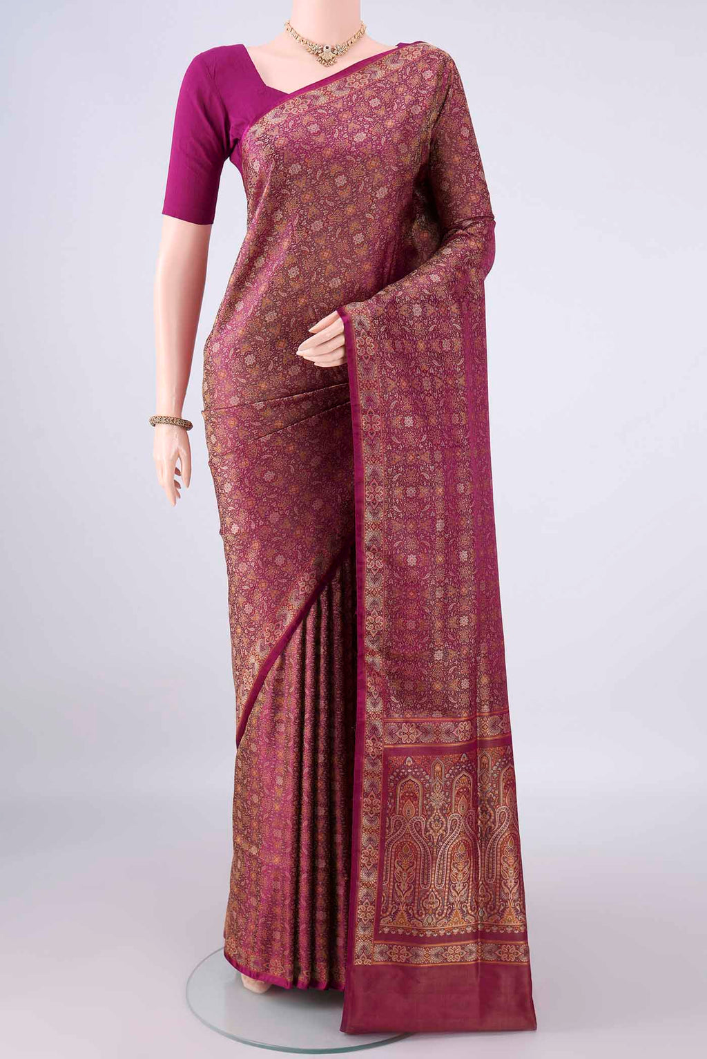 Pure Silk Magenta Banarasi Tanchoi Saree with Thread Brocade on the body and Zari And Thread Border.  displayed on a mannequin
