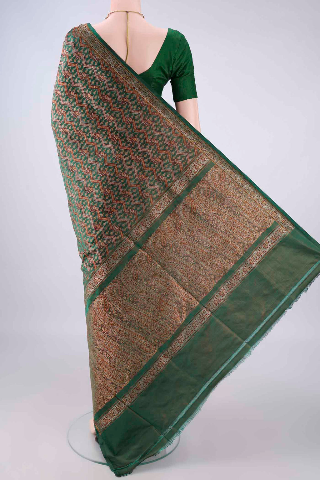 Flat view of Pure Silk Bottle Green Banarasi Tanchoi Saree with Jacquard With Thread Butta on the body and Thread Border. 