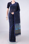Pure Silk Blue Grey Jute Saree with Jamdani on the body and Plain Border.  displayed on a mannequin
