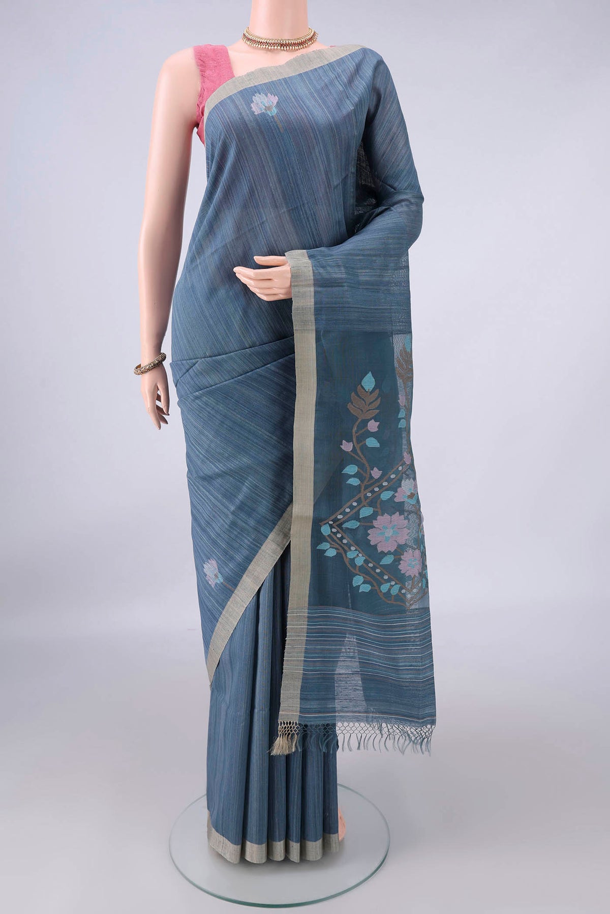 Pure Silk Blue Grey Jute Saree with Jamdani on the body and Plain Border.  displayed on a mannequin