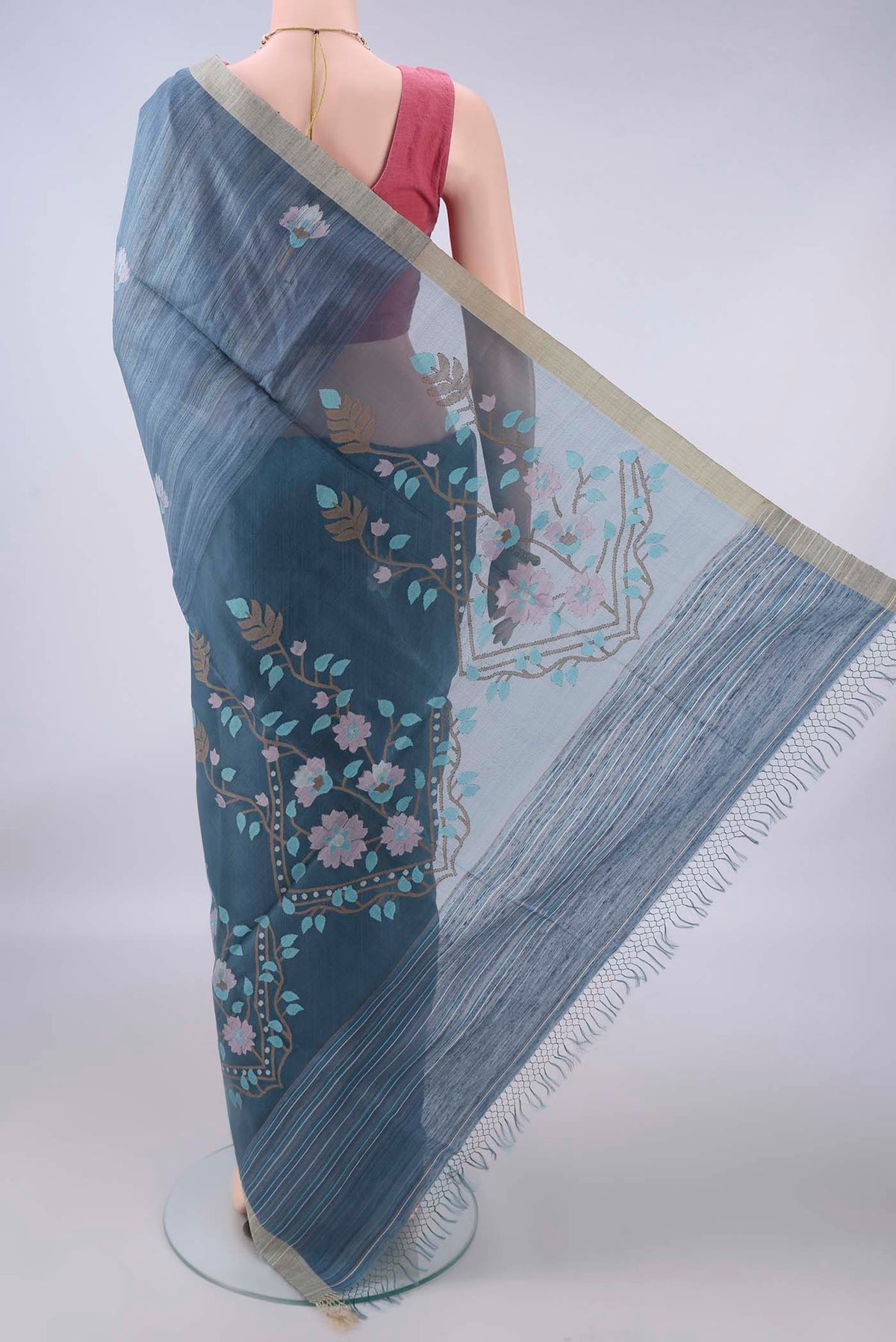 Flat view of Pure Silk Blue Grey Jute Saree with Jamdani on the body and Plain Border. 
