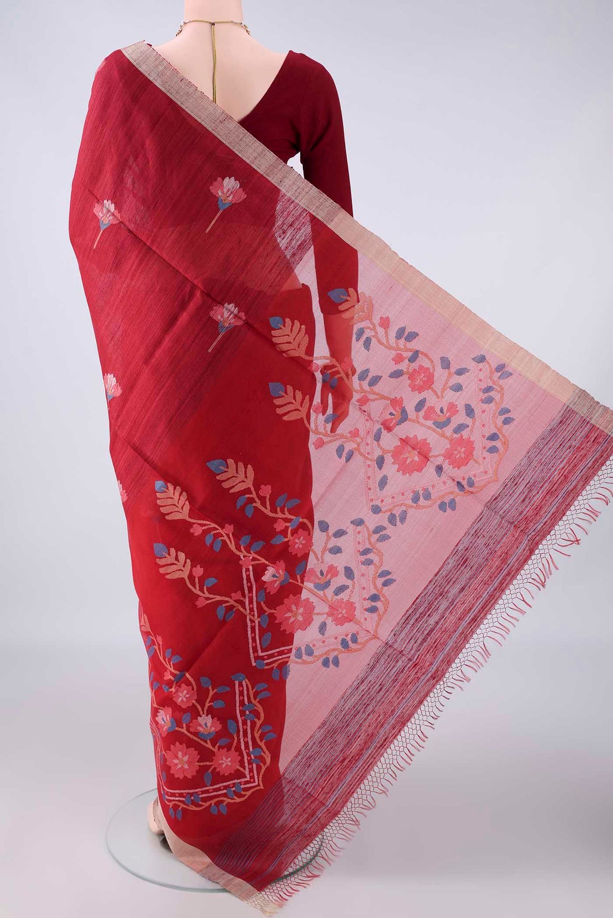 Flat view of Pure Silk Maroon Jute Saree with Jamdani on the body and Plain Border. 