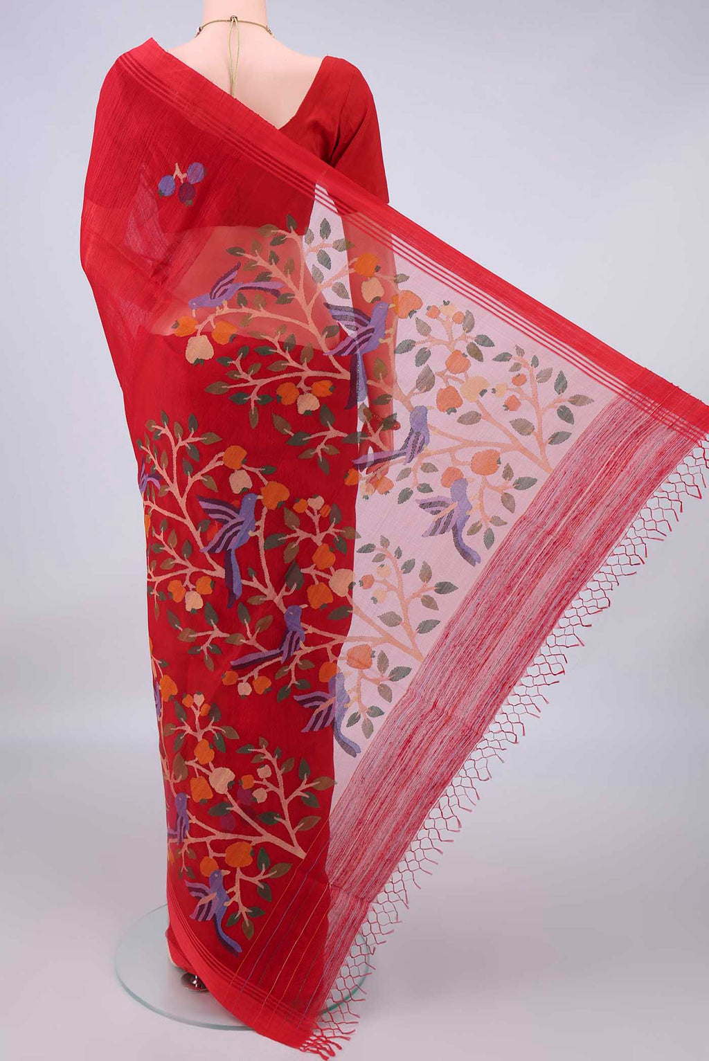 Flat view of Pure Silk Red Jute Saree with Jamdani on the body and Plain Border. 