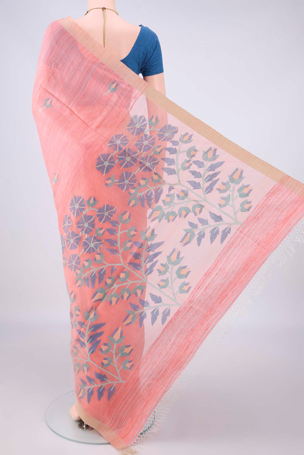 Flat view of Pure Silk Peach Jute Saree with Jamdani on the body and Plain Border. 