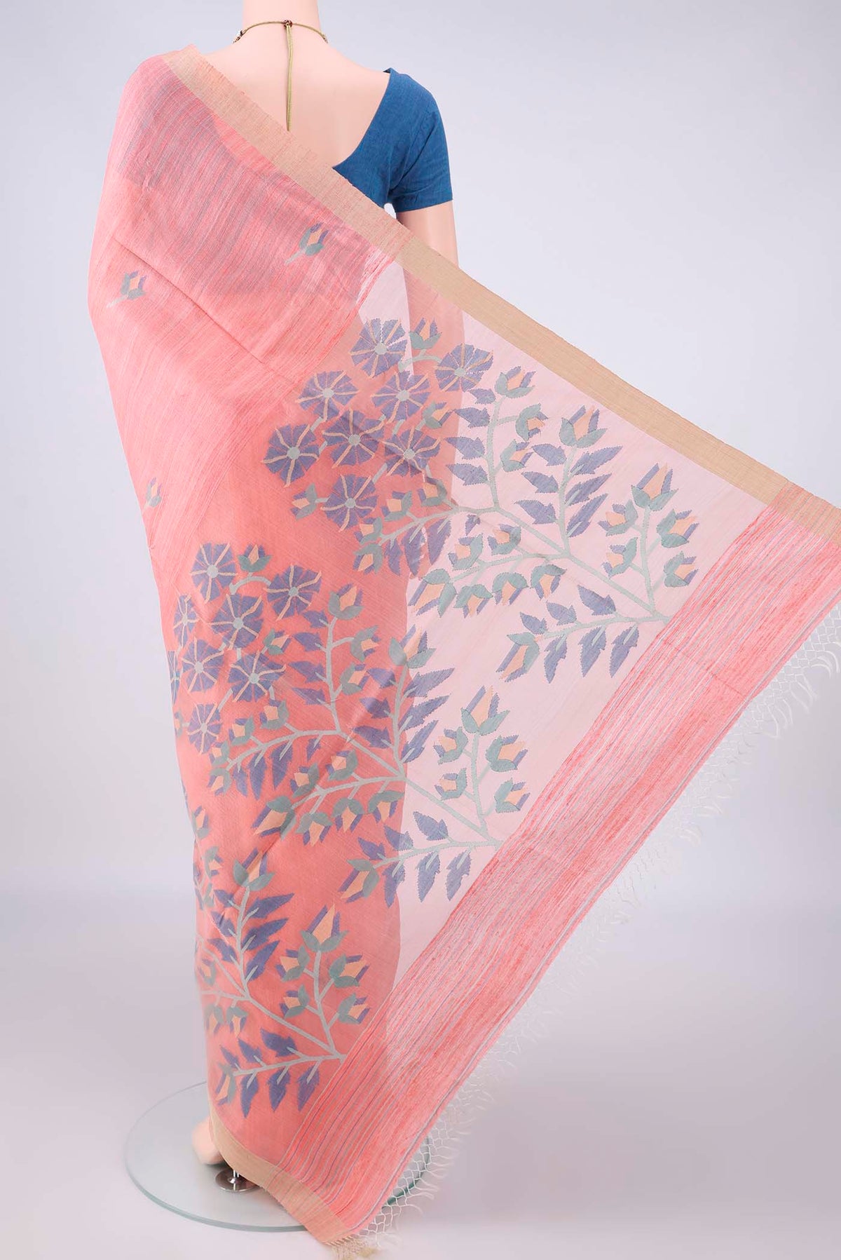 Flat view of Pure Silk Peach Jute Saree with Jamdani on the body and Plain Border. 
