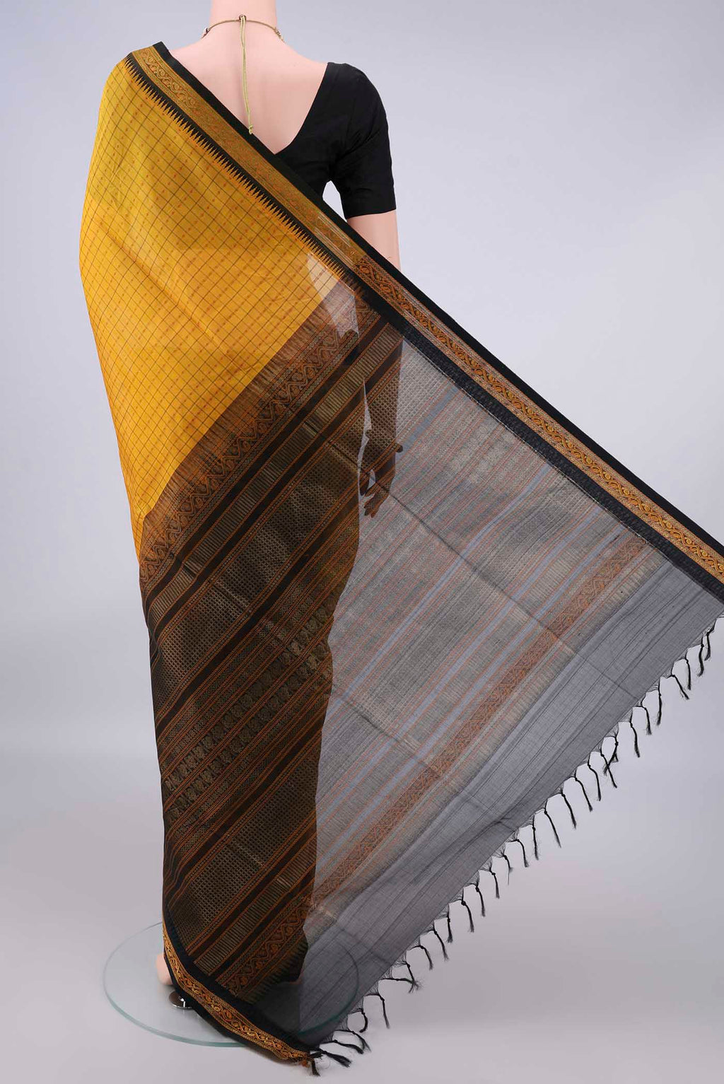 Flat view of Yellow Coimbatore Cotton Saree with Checked design on the body and Thread Border. 
