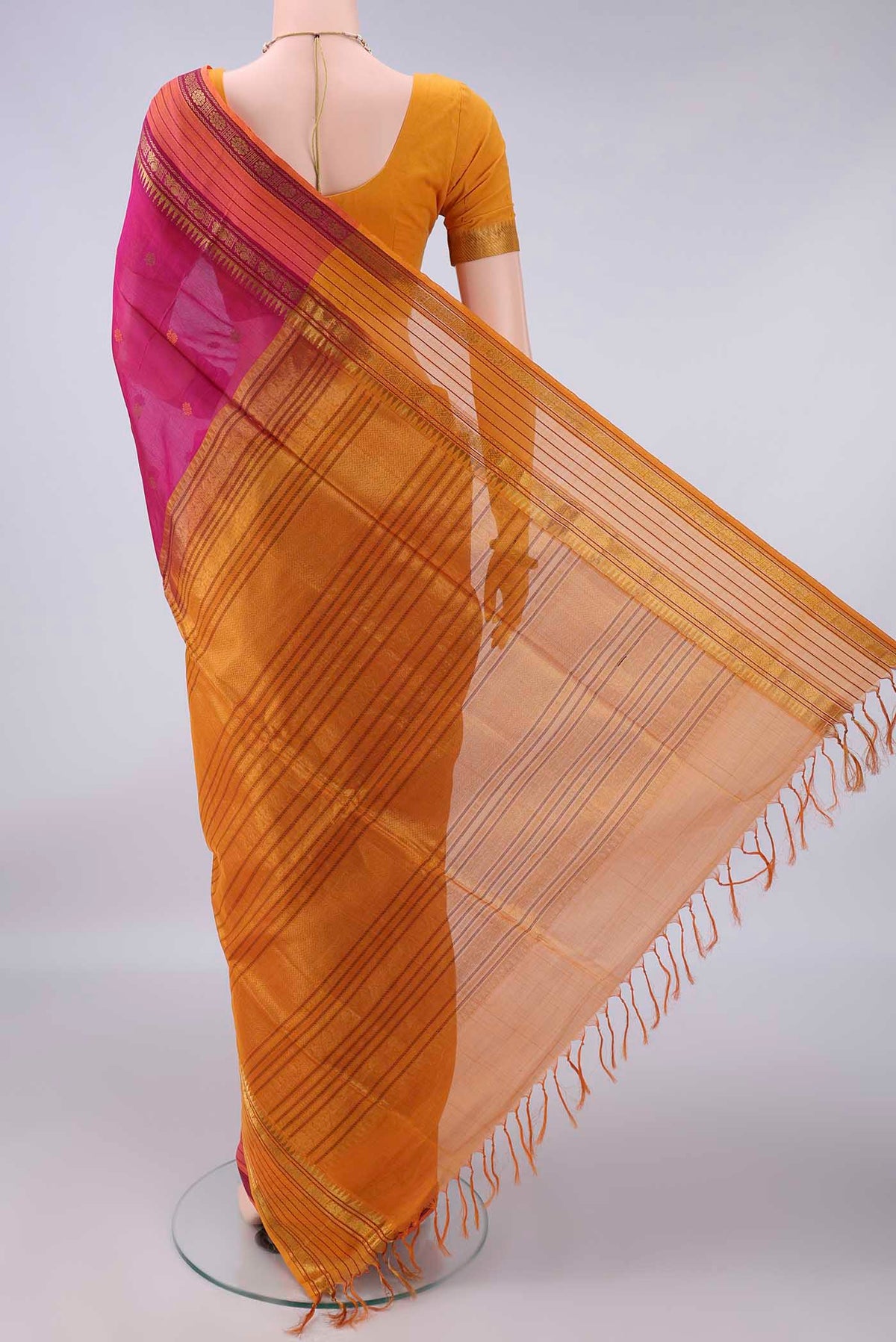 Flat view of Pink Coimbatore Cotton Saree with Thread Butta on the body and Zari Border. 