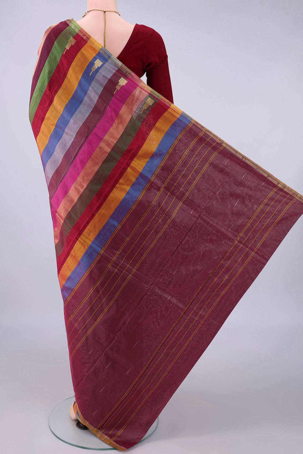 Flat view of Pure Silk Multi Color Kanchipuram Saree with Stripes on the body and Zari Border. 
