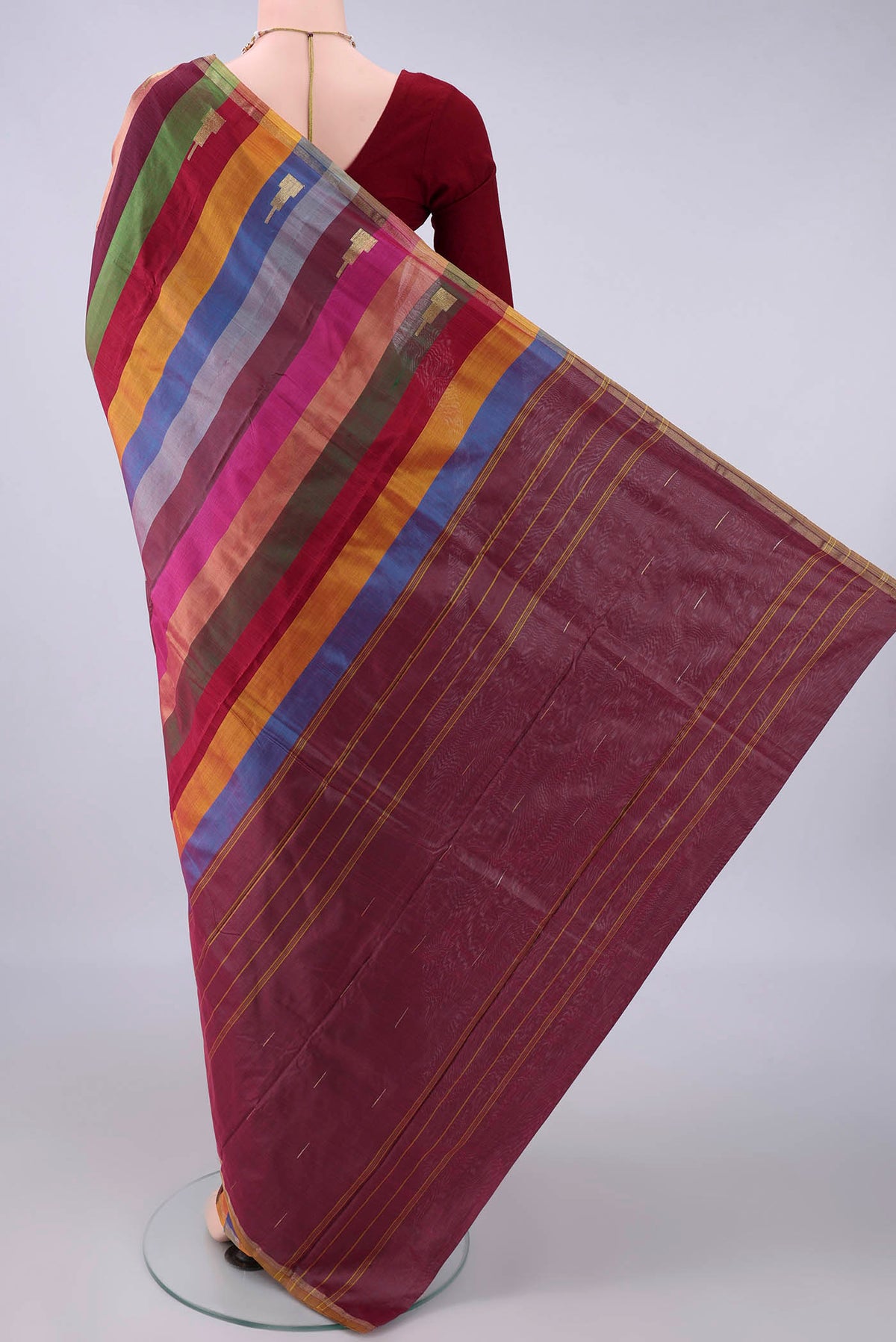 Flat view of Pure Silk Multi Color Kanchipuram Saree with Stripes on the body and Zari Border. 
