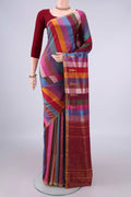 Pure Silk Multi Color Kanchipuram Saree with Stripes on the body and Thin Zari Line.  displayed on a mannequin