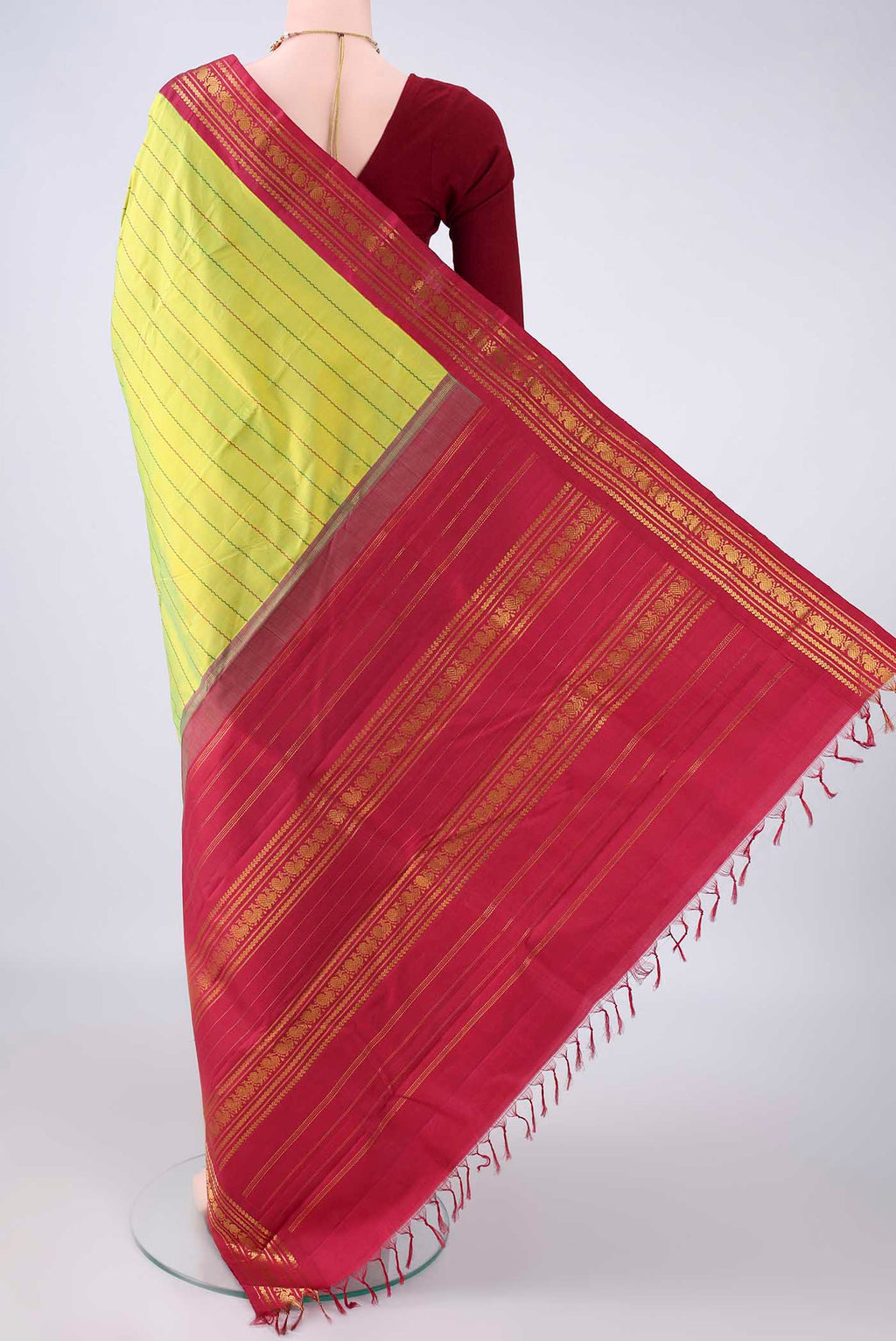 Flat view of Pure Silk Parrot Green Kanchipuram Saree with Veldhari on the body and Zari Border. 