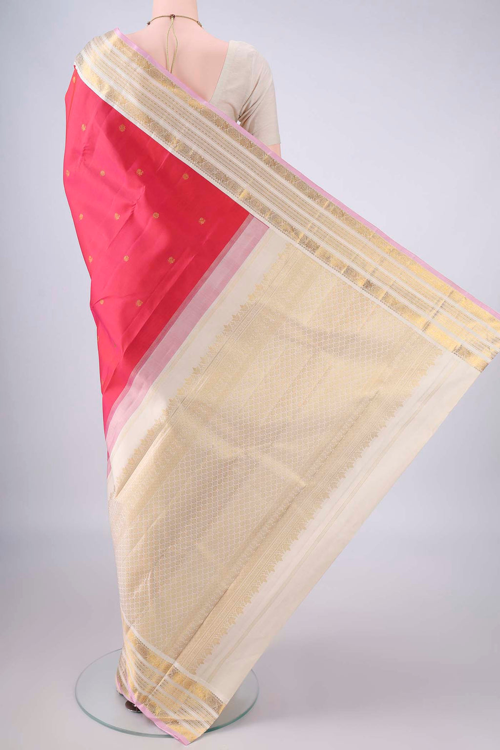 Flat view of Pure Silk Imperial Red Kanjivaram Saree with Zari Butta on the body and Zari Border. 