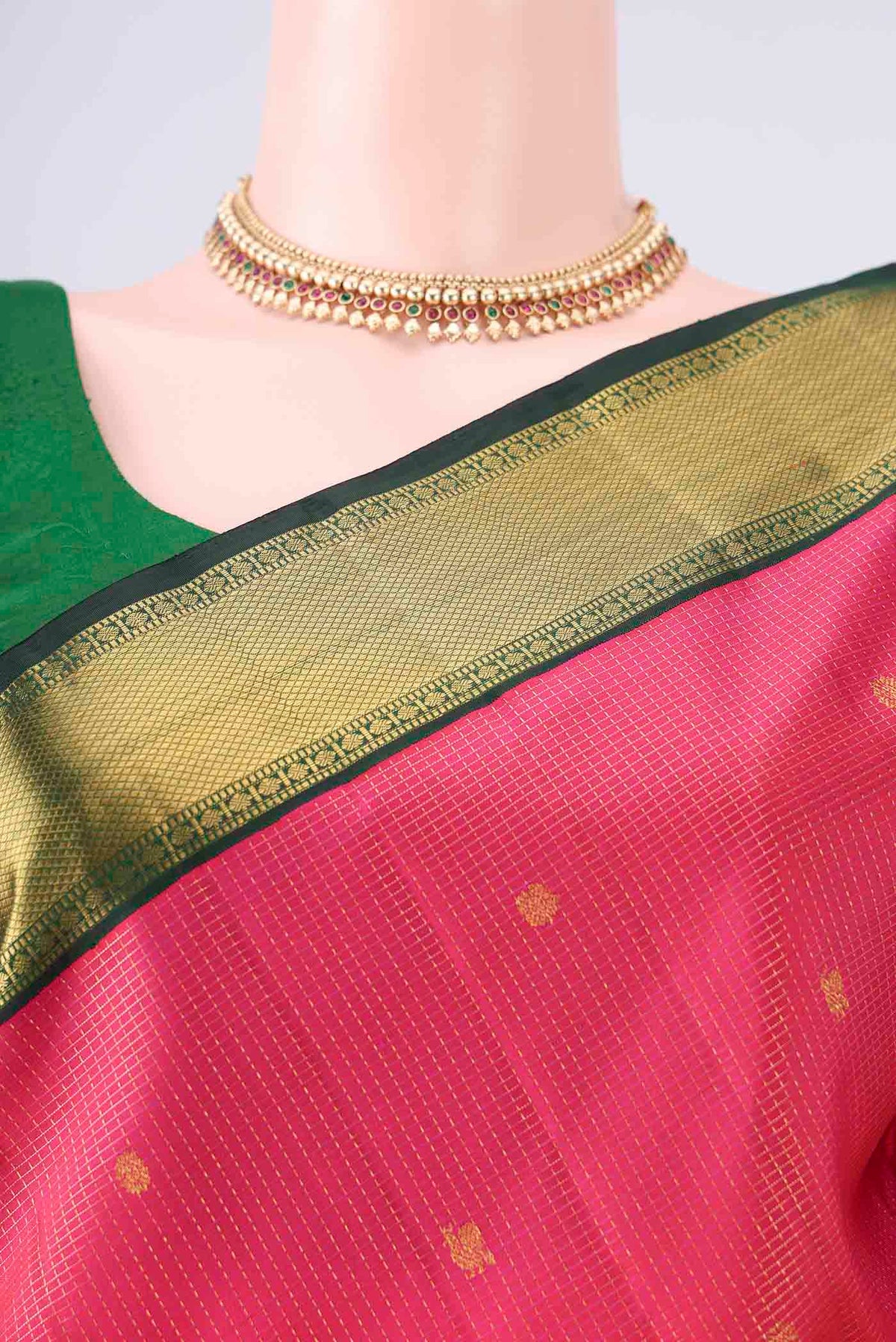 Border image of Pure Silk Pure Zari Dark Pink Kanchipuram Saree with Checked design on the body and Zari Border. 