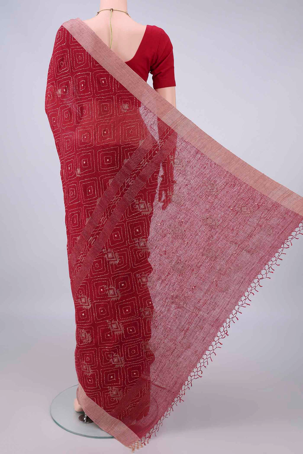 Flat view of Red Linen Saree with Plain Body and Plain Border. 