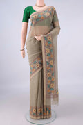 Dark Beige Linen Saree with Plain Body and Thread Border.  displayed on a mannequin