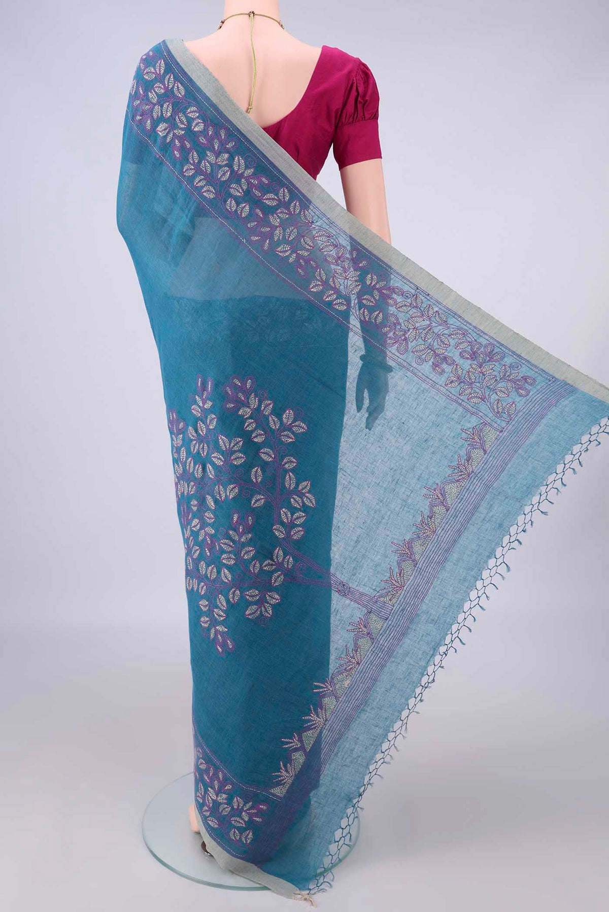 Flat view of Blue Linen Saree with Plain Body and Plain Border. 
