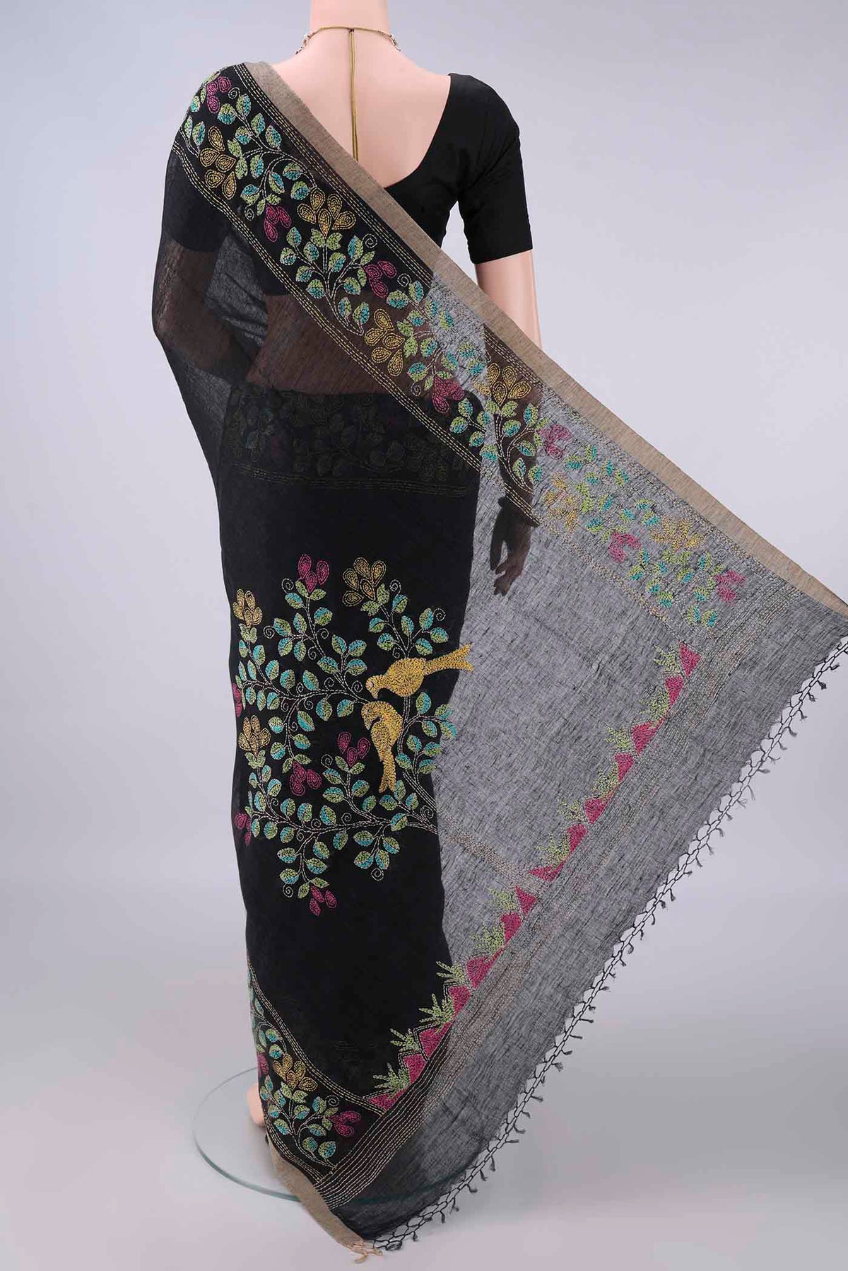 Flat view of Black Linen Saree with Plain Body and Thread Border. 
