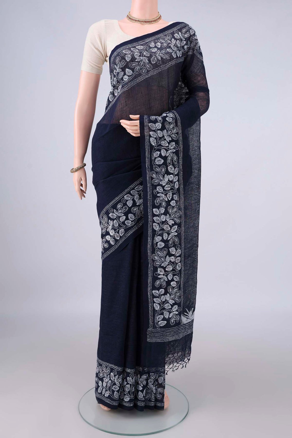 Navy Blue Linen Saree with Plain Body and Thread Border.  displayed on a mannequin